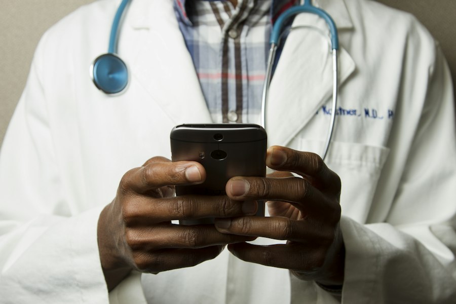 A healthcare professional using a mobile phone